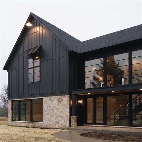 black metal barn house|white and black barndominium.